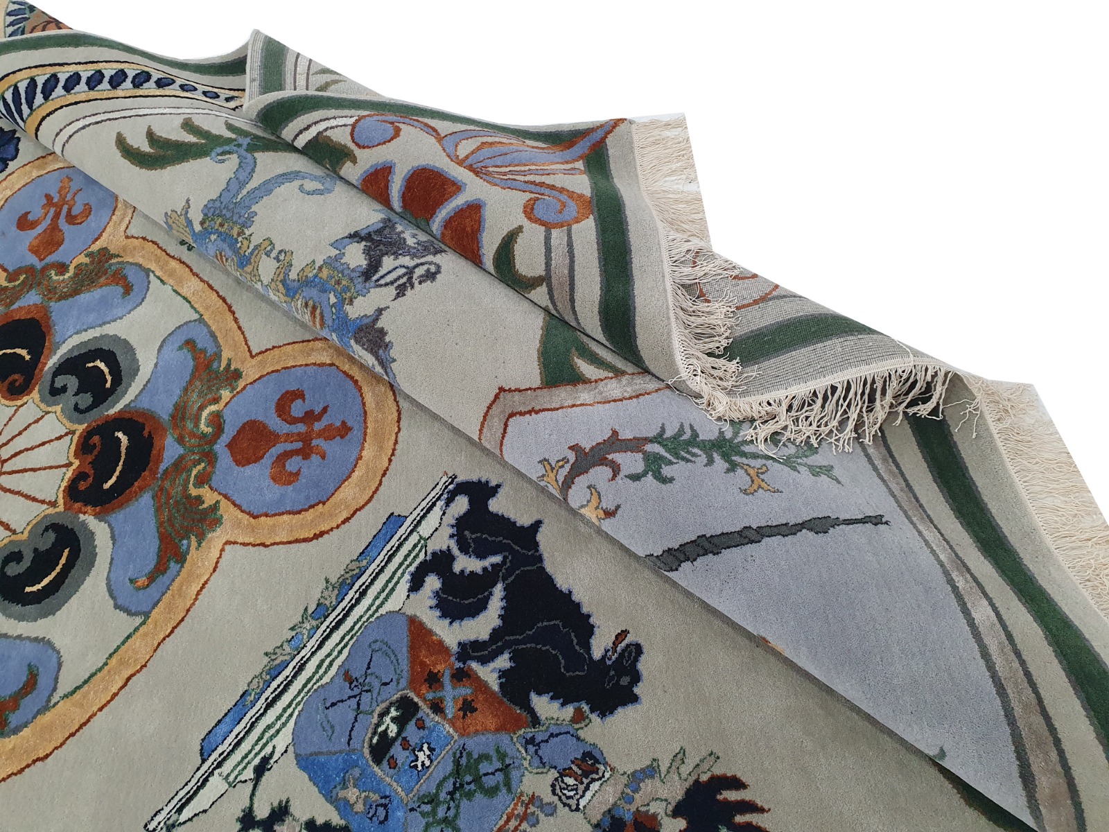 Detail of the hand-woven Ritarit carpet, folded to show pile and fringe